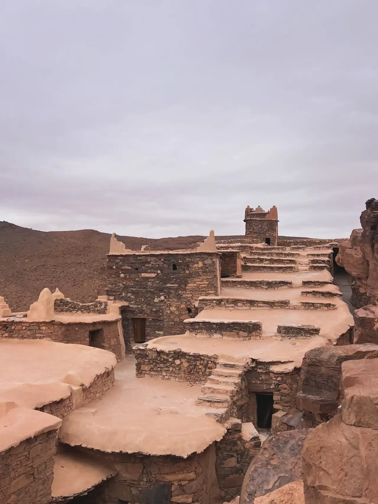 Weathered mud-brick towers of an ancient Berber kasbah in southern Morocco