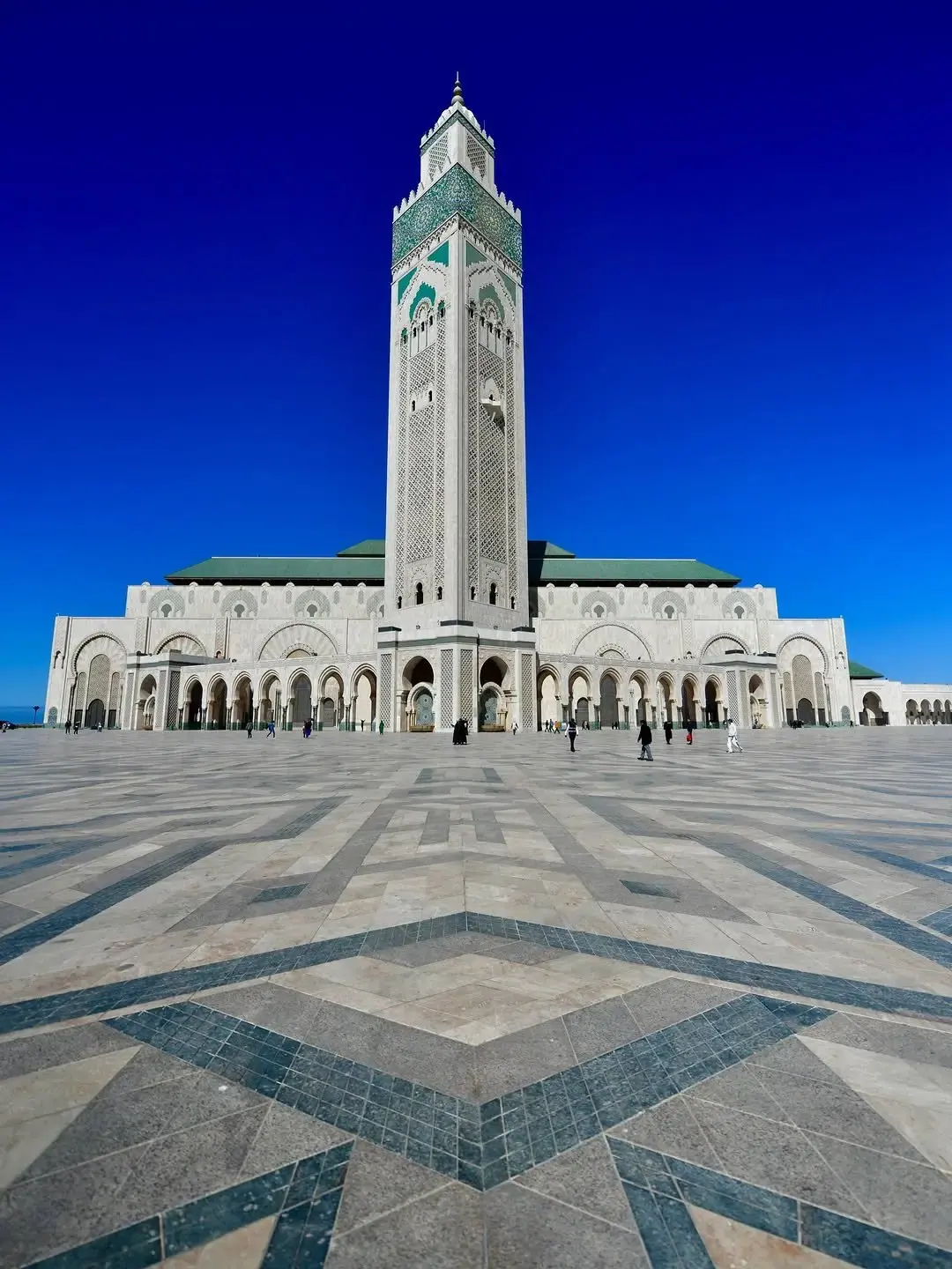 The Hassan II Mosque rising above the ocean front in Casablanca