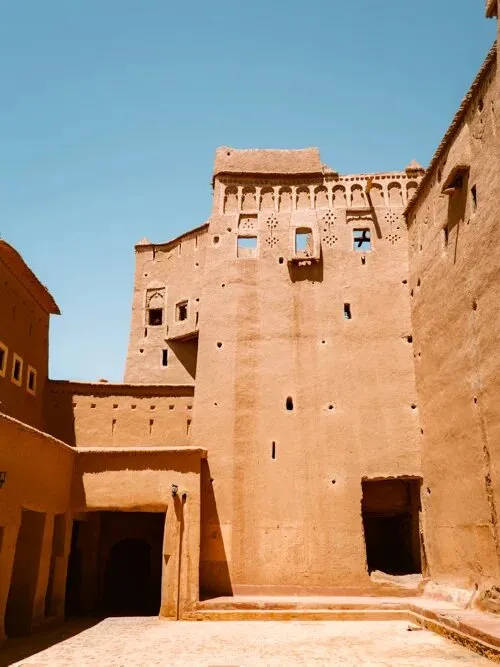 Ouarzazate, Morocco — kasbah architecture under a wide desert sky on the edge of the Sahara